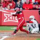 Oklahoma utility Alynah Torres (40) hits a single during an NCAA softball game between Oklahoma (OU) and Liberty on opening day of Oklahoma softball stadium Love's Field in Norman, Okla., on Friday, March 1, 2024.