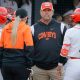 Oklahoma State coach Kenny Gajewski talks with players during a game between the Oklahoma State Cowgirls (OSU) and the UMBC Retrievers in the Stillwater Regional of the NCAA softball tournament in Stillwater, Okla., Friday, May 19, 2023. Oklahoma State won 9-0.