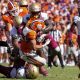 Sep 23, 2023; Clemson, South Carolina, USA; Clemson Tigers running back Will Shipley (1) is tackled by Florida State Seminoles linebacker Tatum Bethune (15) in the second half at Memorial Stadium. Mandatory Credit: David Yeazell-USA TODAY Sports