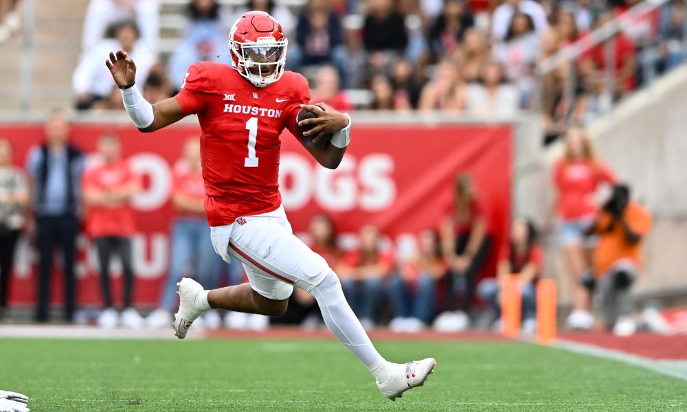 Nov 18, 2023; Houston, Texas, USA; Houston Cougars quarterback Donovan Smith (1) runs the ball during the first quarter against the Oklahoma State Cowboys at TDECU Stadium. Mandatory Credit: Maria Lysaker-USA TODAY Sports