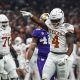 Texas Longhorns running back CJ Baxter (4) celebrates a first down during the Sugar Bowl College Football Playoff semifinals game against the Washington Huskies at the Caesars Superdome on Monday, Jan. 1, 2024 in New Orleans, Louisiana.