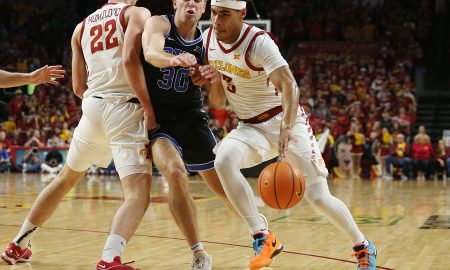 Iowa State Cyclones guard Tamin Lipsey (3) drives to the basket as BYU Cougars guard Dallin Hall (30) defends during the first half in the Senior Day Big-12 conference showdown of an NCAA college basketball at Hilton Coliseum on Wednesday, March 6, 2024, in Ames, Iowa.