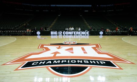 Mar 12, 2024; Kansas City, MO, USA; Big 12 Championship logo at center court prior to the game between the UCF Knights and the Oklahoma State Cowboys at T-Mobile Center. Mandatory Credit: William Purnell-USA TODAY Sports