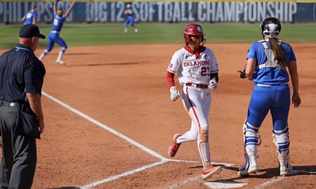 Oklahoma second baseman Tiare Jennings (23) scores a run in the first inning of a Big 12 softball tournament game between the University of Oklahoma Sooners (OU) and the BYU Cougars at Devon Park in Oklahoma City, Friday, May 10, 2024. Oklahoma won 13-2.