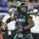 Sep 13, 2024; Kansas City, Kansas, USA; Kansas Jayhawks quarterback Jalon Daniels (6) throws a pass during the second half against the UNLV Rebels at Children's Mercy Park. Mandatory Credit: Jay Biggerstaff-Imagn Images